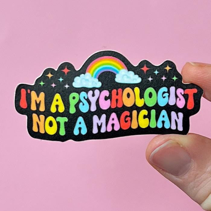 Sticker with 'I'm a psychologist not a magician' text on a pink background
