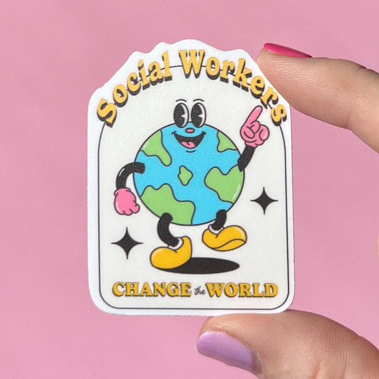 Sticker with cartoon Earth character and text 'Social Workers Change the World' held by a hand against a pink background