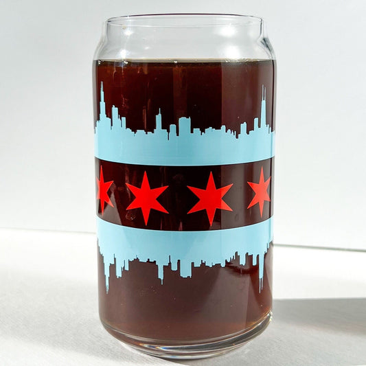 Glass can with Chicago skyline and star design on a white background