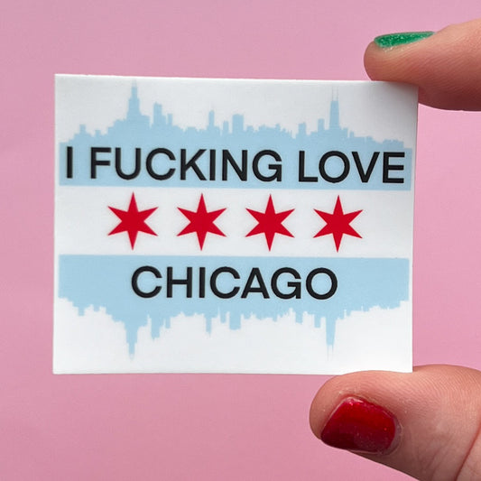 Sticker with 'I F***ING LOVE CHICAGO' on the Chicago skyline and Chicago flag held against a pink background
