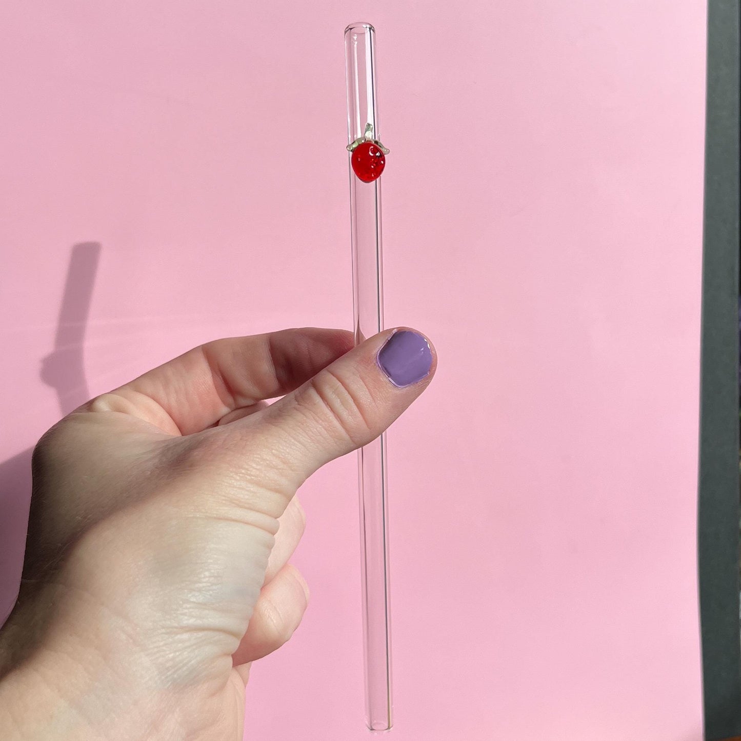 glass straw with decal for 16 oz cup. 8 inches long with a bend. Glass and dishwasher safe