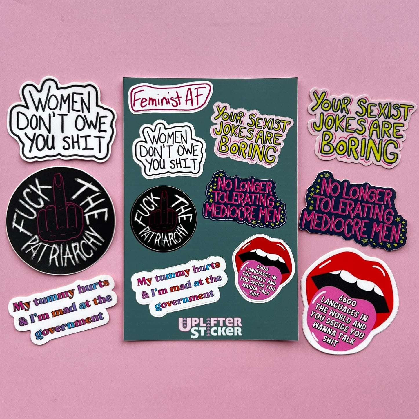Feminist sticker pack with their larger, individual sticker next to it.