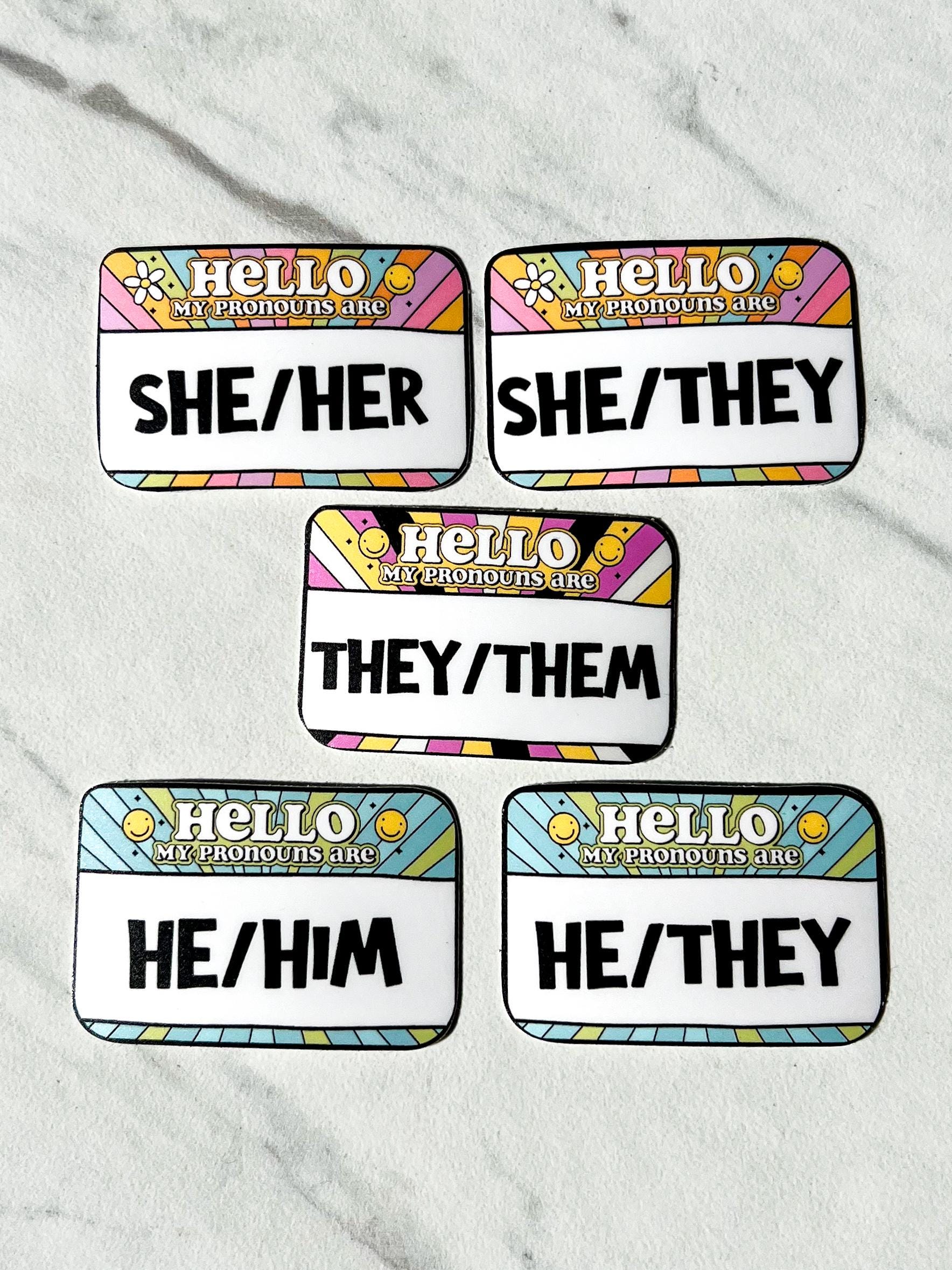 Set of pronoun stickers on a marble background